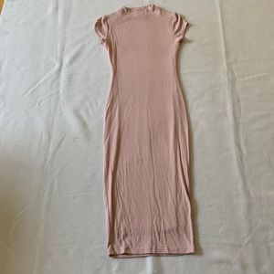 Pink form-fitting midi dress